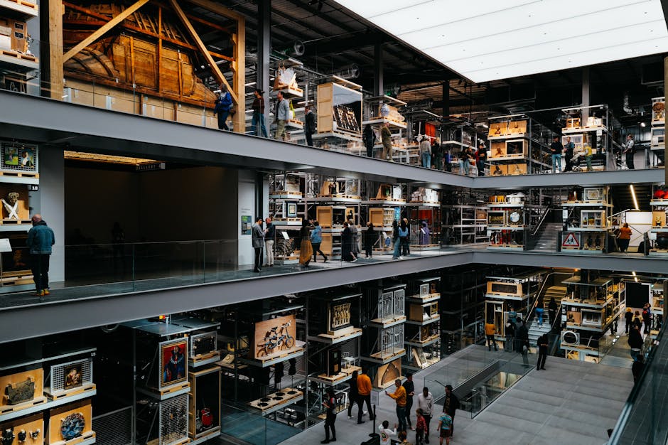 Explore the dynamic interior of a modern multi-level museum showcasing diverse exhibits with a vibrant public atmosphere.